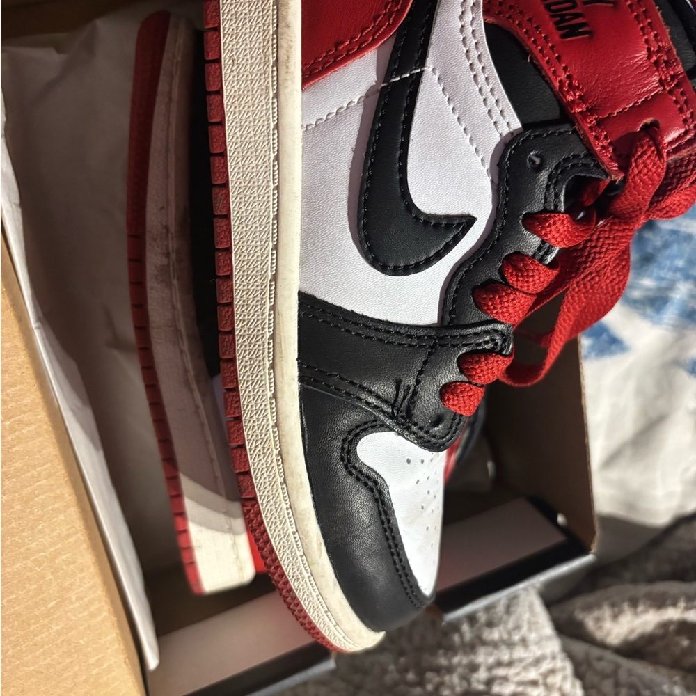 Nike Air Jordan Red, Black, and White High Tops